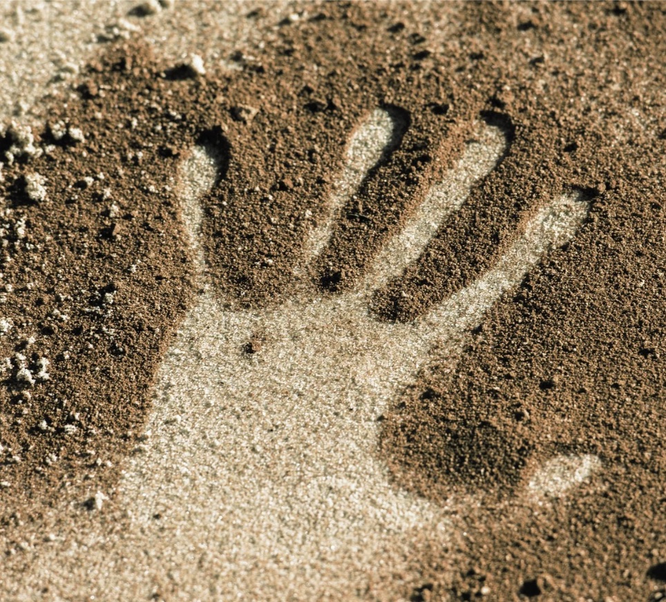 Handafdruk in aarde